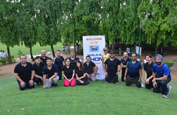 Employees celebrating International Yoga Day at Baxter India